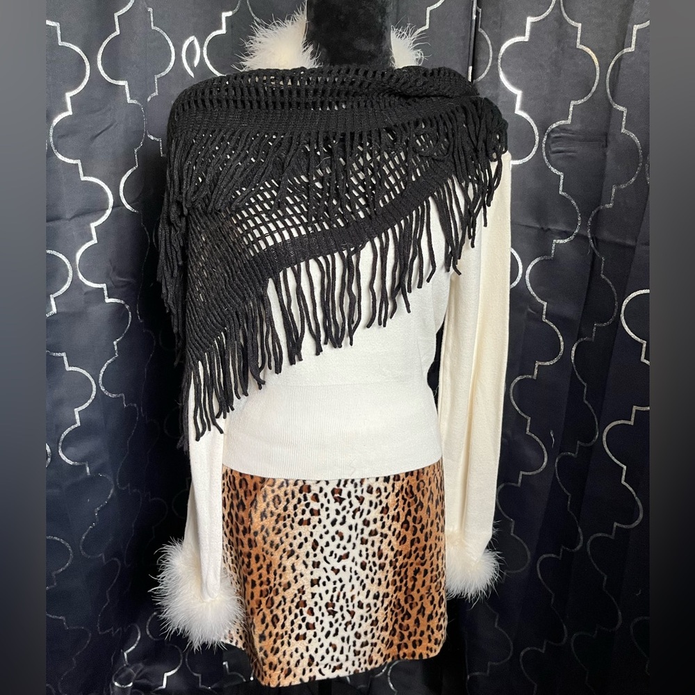 Black Fringe Shawl with Leopard Skirt and White Sweater for appeal
